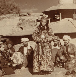 File:Samarkand A group of musicians playing for a bacha dancing boy.jpg