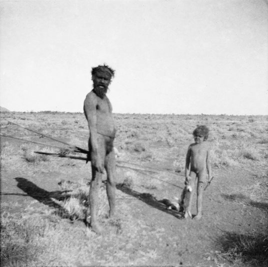 File:BASEDOW Herbert 1903 Old man Munnkie and child surprised while rabbit-hunting, southern Musgrave Ranges, South Australia 536x534.jpg